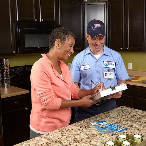 contractor discussing drain cleaning